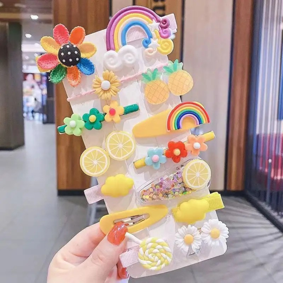 Colorful hair Clips set with flowers, rainbows, and lemons on a white card.