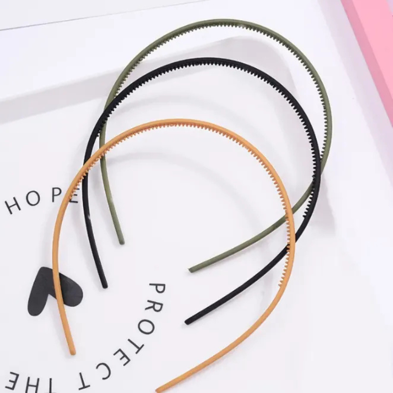 hairbands in black, green, and brown 