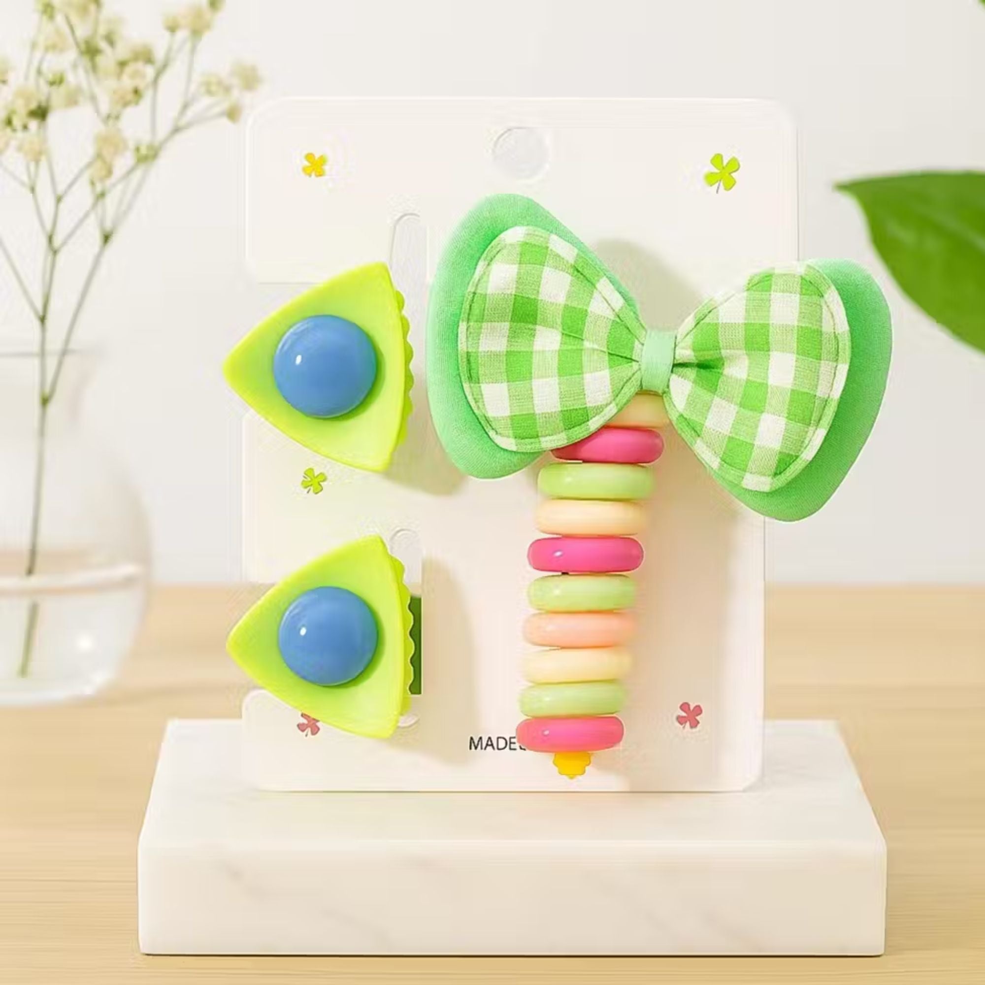 Includes 1 green check bow clip and 2 yellow-blue mini clips