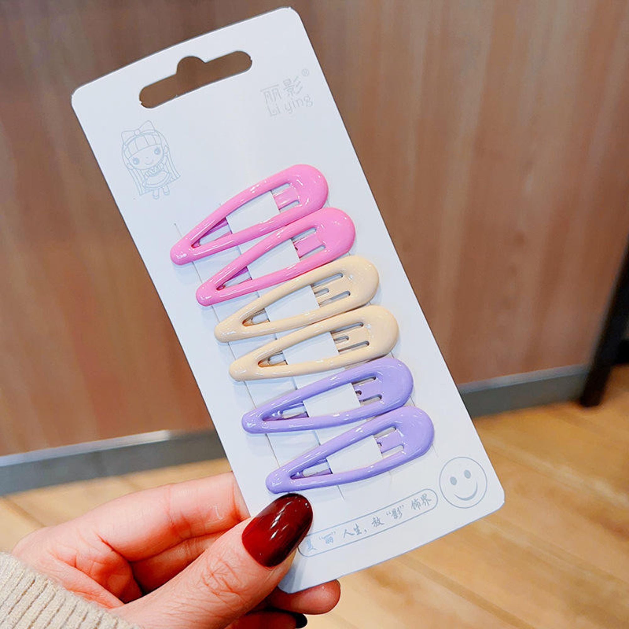 Pack includes 6 pastel-colored snap hair clips  Made with durable metal and glossy coating